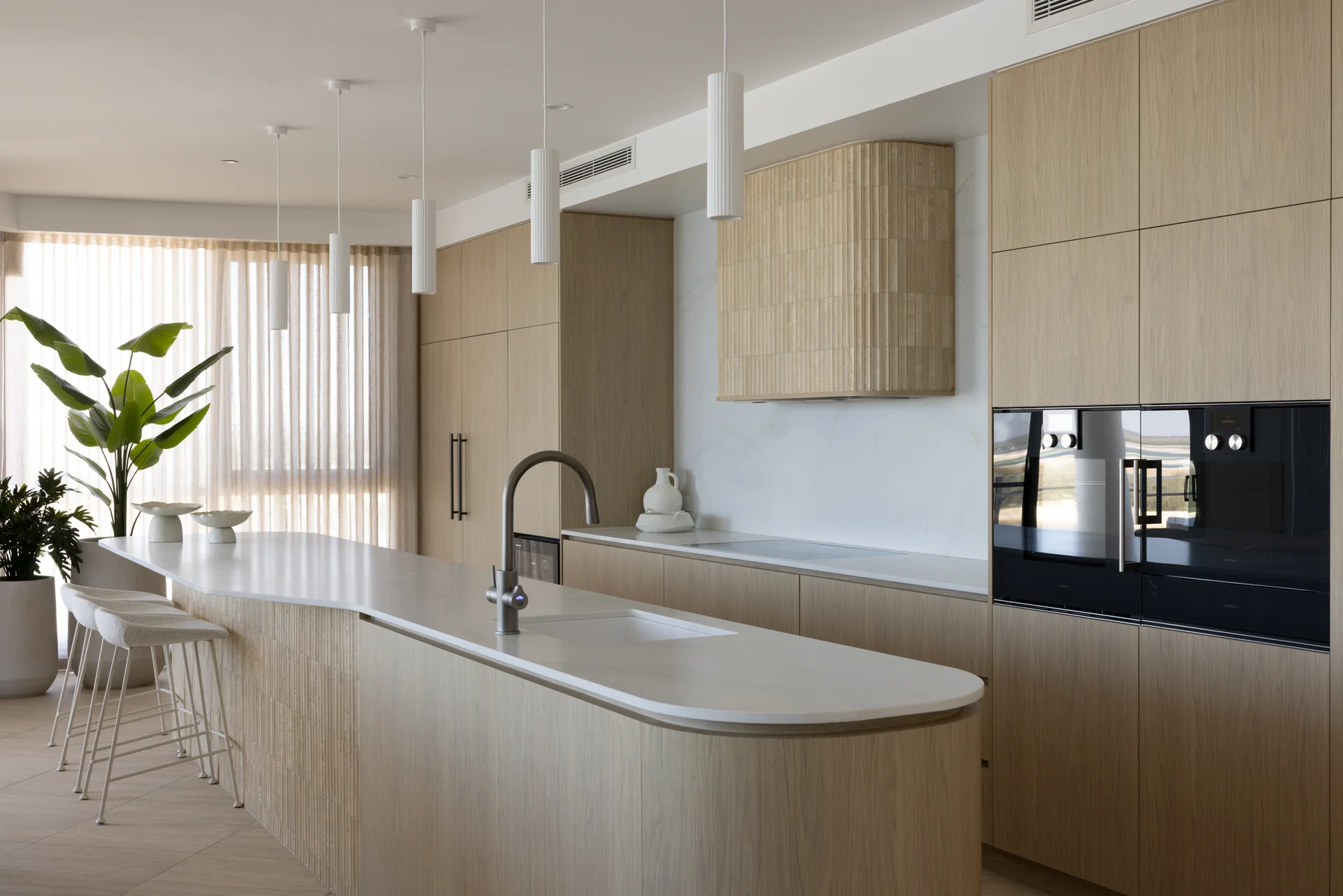 Calacatta Leggera stone benchtop in a contemporary kitchen